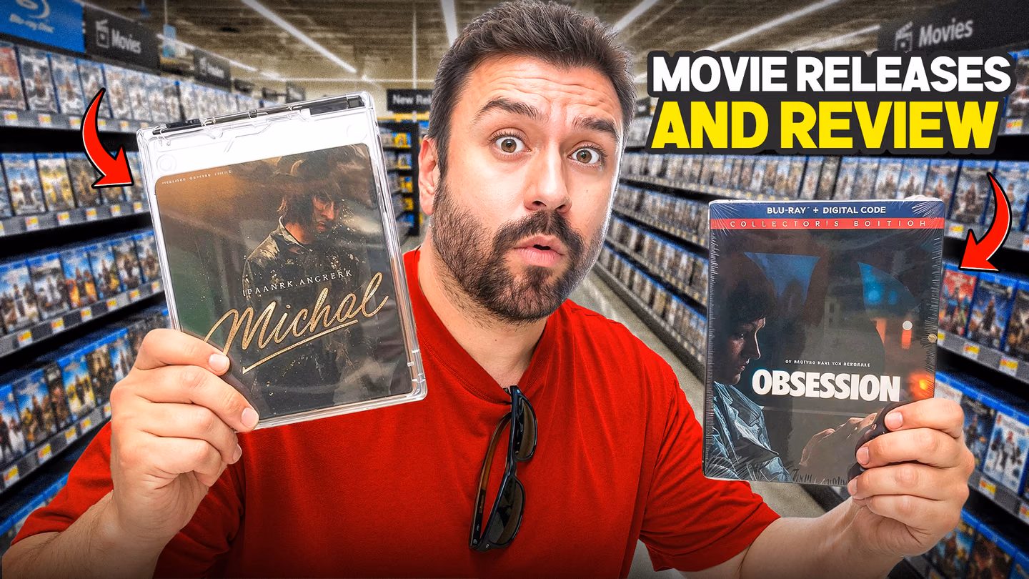 A surprised reviewer holds two movie cases in a media store beneath a releases and review headline.
