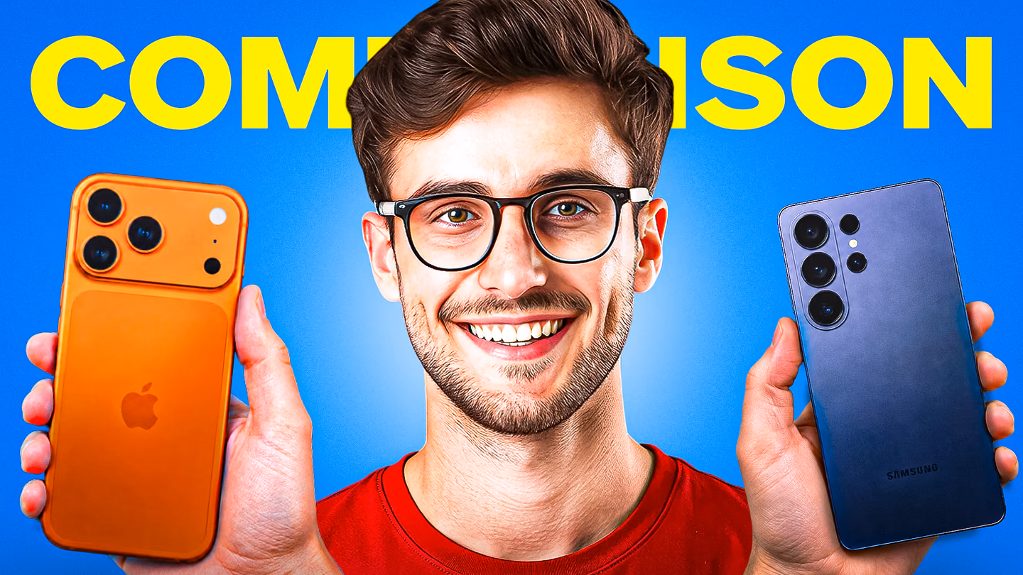 A smiling reviewer holds an orange iPhone and dark Samsung phone against a blue comparison background.
